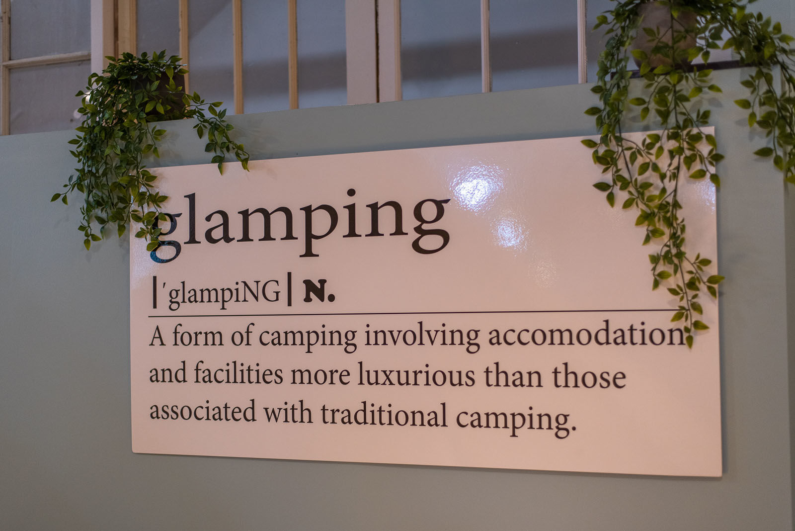 Keefe Vacation rental's new "glamping" facility includes a sign that lists the definition of "glamping"